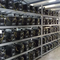 A miner working on a rig while networking with peers